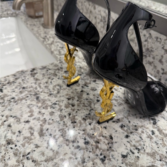 Yves Saint Laurent Black Heels with Gold Logo Accent - Picture 2 of 6